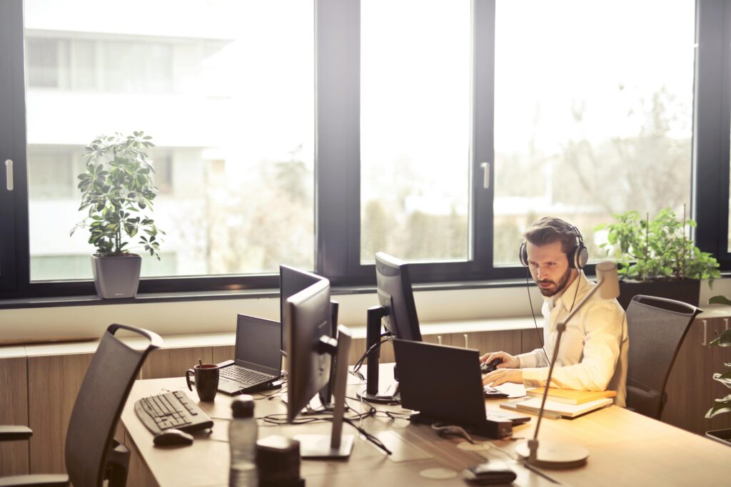 Man in a room of computers